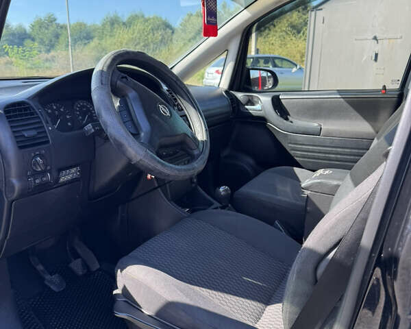 Черный Опель Зафира, объемом двигателя 2 л и пробегом 264 тыс. км за 4200 $, фото 3 на Automoto.ua