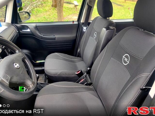 Черный Опель Зафира, объемом двигателя 1.6 л и пробегом 200 тыс. км за 4800 $, фото 3 на Automoto.ua