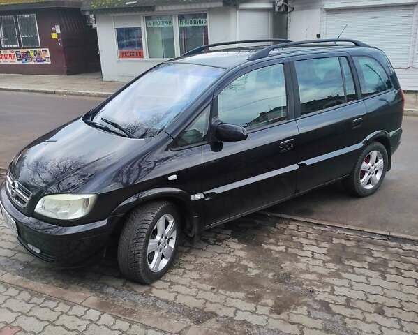 Черный Опель Зафира, объемом двигателя 1.6 л и пробегом 289 тыс. км за 4500 $, фото 1 на Automoto.ua