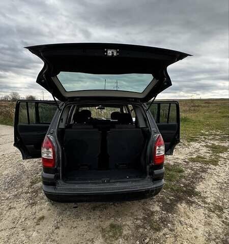 Черный Опель Зафира, объемом двигателя 2 л и пробегом 370 тыс. км за 3800 $, фото 1 на Automoto.ua