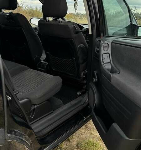 Черный Опель Зафира, объемом двигателя 2 л и пробегом 370 тыс. км за 3800 $, фото 4 на Automoto.ua