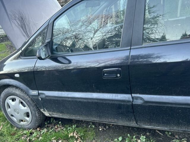 Черный Опель Зафира, объемом двигателя 2 л и пробегом 316 тыс. км за 3500 $, фото 4 на Automoto.ua