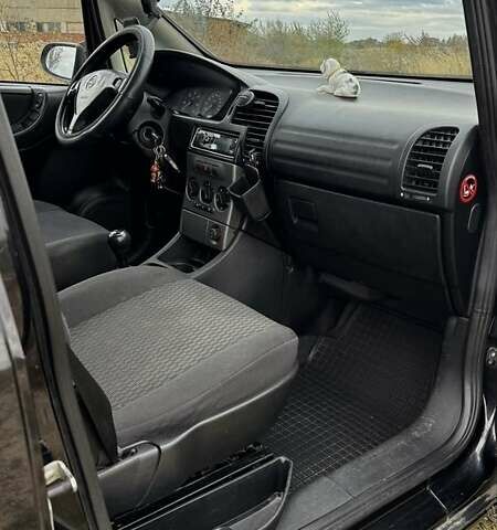 Черный Опель Зафира, объемом двигателя 2 л и пробегом 370 тыс. км за 3800 $, фото 3 на Automoto.ua