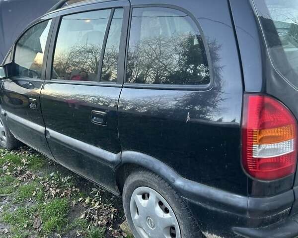 Черный Опель Зафира, объемом двигателя 2 л и пробегом 316 тыс. км за 3500 $, фото 4 на Automoto.ua