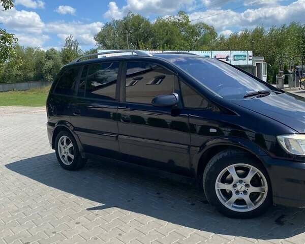 Черный Опель Зафира, объемом двигателя 2.2 л и пробегом 450 тыс. км за 4000 $, фото 11 на Automoto.ua