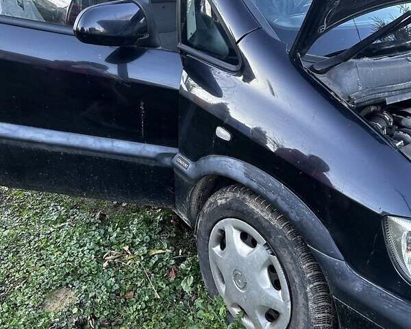Черный Опель Зафира, объемом двигателя 2 л и пробегом 316 тыс. км за 3500 $, фото 7 на Automoto.ua