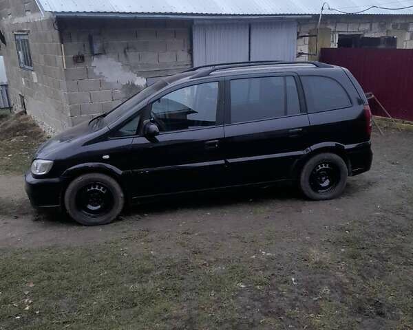 Черный Опель Зафира, объемом двигателя 2 л и пробегом 300 тыс. км за 4100 $, фото 4 на Automoto.ua