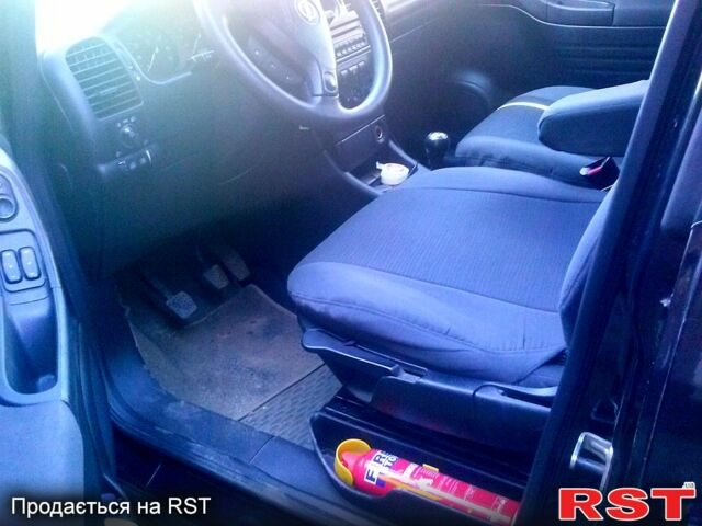 Черный Опель Зафира, объемом двигателя 1.8 л и пробегом 189 тыс. км за 4700 $, фото 7 на Automoto.ua