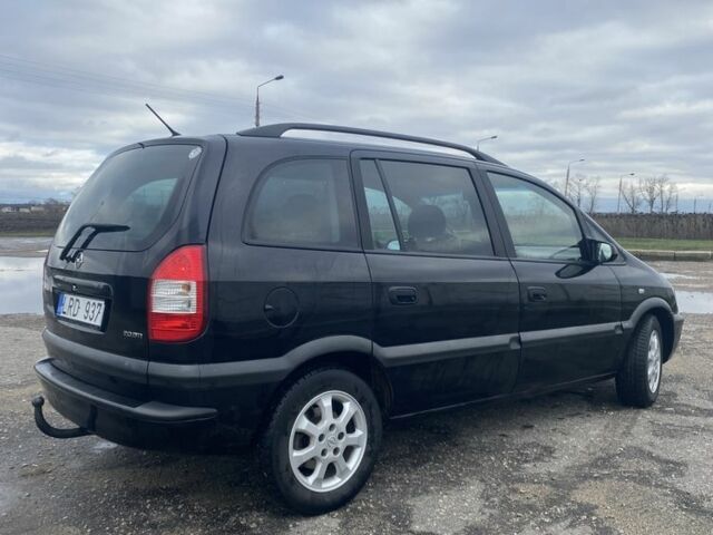 Черный Опель Зафира, объемом двигателя 2 л и пробегом 287 тыс. км за 2450 $, фото 3 на Automoto.ua