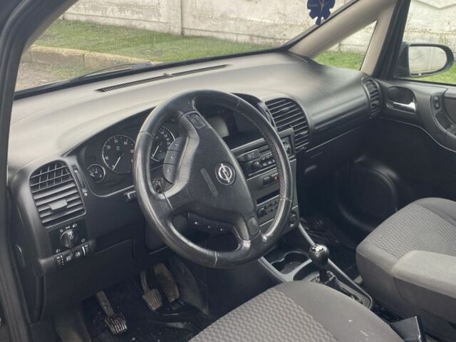 Черный Опель Зафира, объемом двигателя 2 л и пробегом 287 тыс. км за 2450 $, фото 7 на Automoto.ua