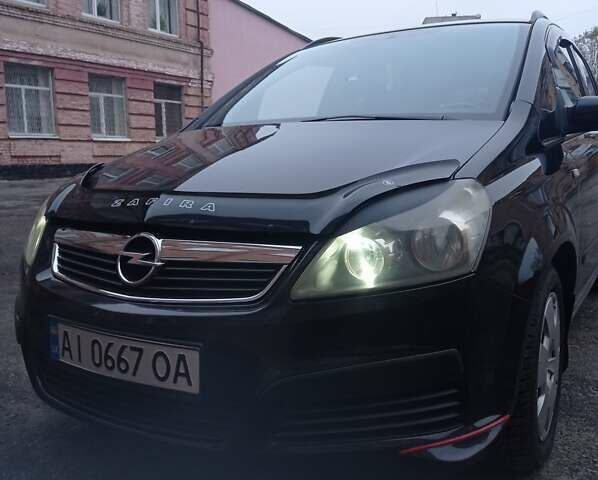 Черный Опель Зафира, объемом двигателя 1.8 л и пробегом 238 тыс. км за 5200 $, фото 6 на Automoto.ua