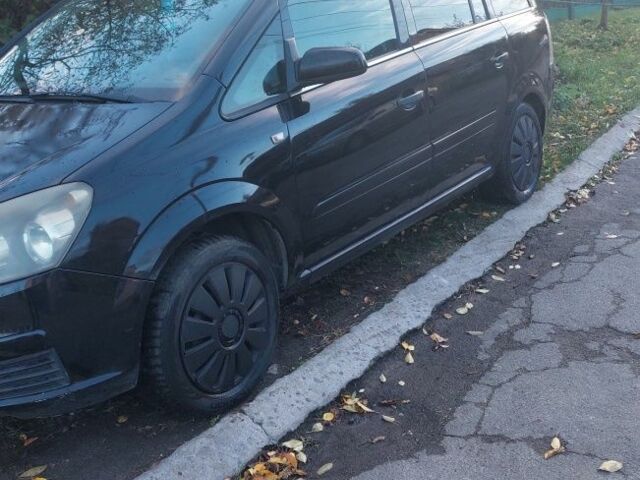 Черный Опель Зафира, объемом двигателя 1.8 л и пробегом 294 тыс. км за 6000 $, фото 2 на Automoto.ua