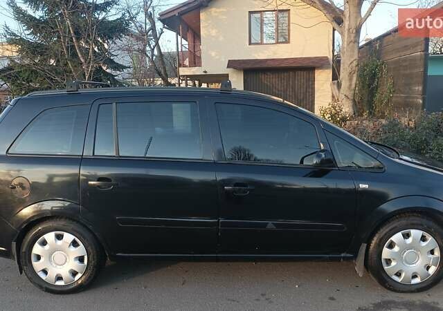 Черный Опель Зафира, объемом двигателя 1.8 л и пробегом 257 тыс. км за 5600 $, фото 1 на Automoto.ua