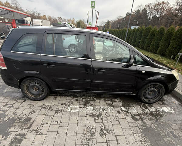 Черный Опель Зафира, объемом двигателя 1.91 л и пробегом 293 тыс. км за 5000 $, фото 7 на Automoto.ua