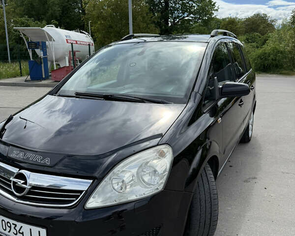 Черный Опель Зафира, объемом двигателя 1.9 л и пробегом 315 тыс. км за 6600 $, фото 3 на Automoto.ua