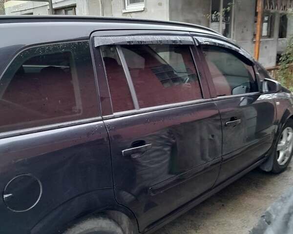 Черный Опель Зафира, объемом двигателя 1.9 л и пробегом 395 тыс. км за 6519 $, фото 6 на Automoto.ua