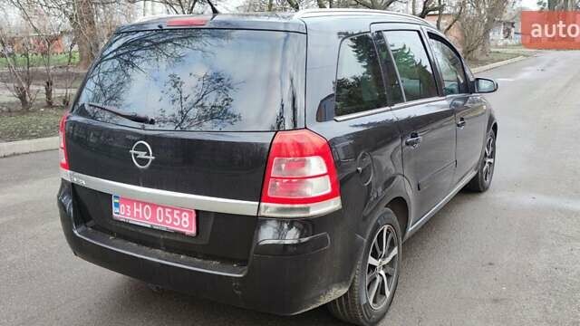 Черный Опель Зафира, объемом двигателя 1.8 л и пробегом 226 тыс. км за 7100 $, фото 3 на Automoto.ua