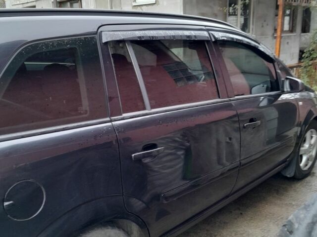 Черный Опель Зафира, объемом двигателя 1.9 л и пробегом 395 тыс. км за 6519 $, фото 7 на Automoto.ua