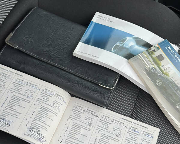 Черный Опель Зафира, объемом двигателя 1.8 л и пробегом 247 тыс. км за 7599 $, фото 40 на Automoto.ua