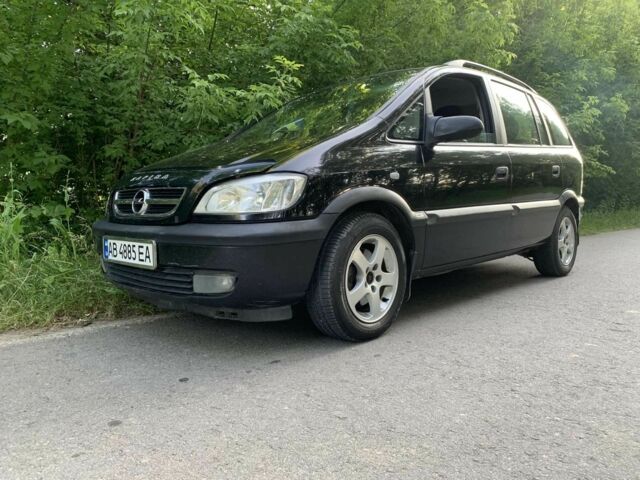 Черный Опель Зафира, объемом двигателя 2 л и пробегом 300 тыс. км за 4000 $, фото 7 на Automoto.ua