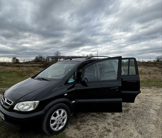 Черный Опель Зафира, объемом двигателя 2 л и пробегом 370 тыс. км за 3800 $, фото 1 на Automoto.ua