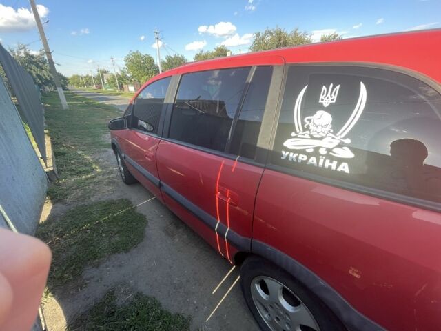 Красный Опель Зафира, объемом двигателя 2.2 л и пробегом 280 тыс. км за 2650 $, фото 2 на Automoto.ua