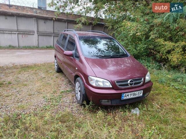 Опель Зафира 2004 в Коростене на Automoto.ua Красный Опель Зафира, объемом двигателя 2.17 л и пробегом 276 тыс. км за 3900 $, фото 10 на Automoto.ua