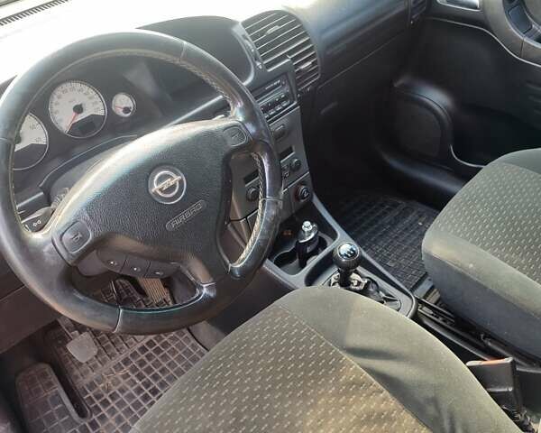 Опель Зафира 2004 в Коростене на Automoto.ua Красный Опель Зафира, объемом двигателя 2.17 л и пробегом 276 тыс. км за 3900 $, фото 15 на Automoto.ua
