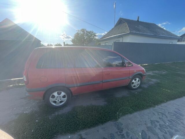 Красный Опель Зафира, объемом двигателя 2.2 л и пробегом 280 тыс. км за 2650 $, фото 1 на Automoto.ua