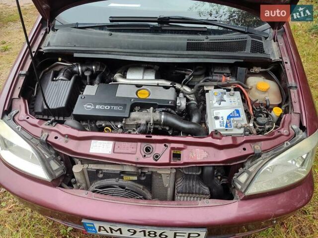 Опель Зафира 2004 в Коростене на Automoto.ua Красный Опель Зафира, объемом двигателя 2.17 л и пробегом 276 тыс. км за 3900 $, фото 3 на Automoto.ua