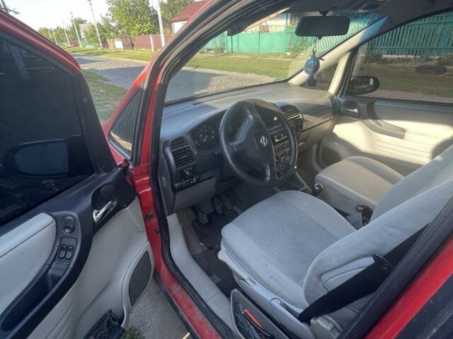 Красный Опель Зафира, объемом двигателя 2.2 л и пробегом 280 тыс. км за 2650 $, фото 4 на Automoto.ua