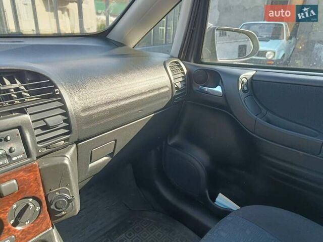 Серый Опель Зафира, объемом двигателя 1.8 л и пробегом 276 тыс. км за 3850 $, фото 3 на Automoto.ua
