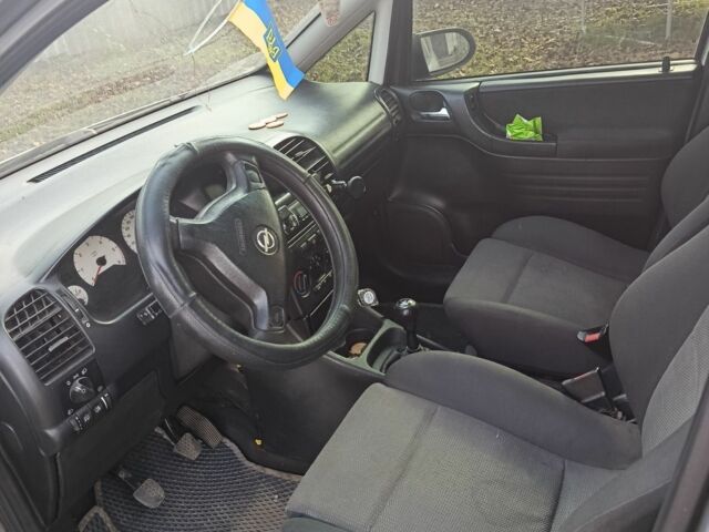 Серый Опель Зафира, объемом двигателя 2 л и пробегом 290 тыс. км за 3900 $, фото 1 на Automoto.ua