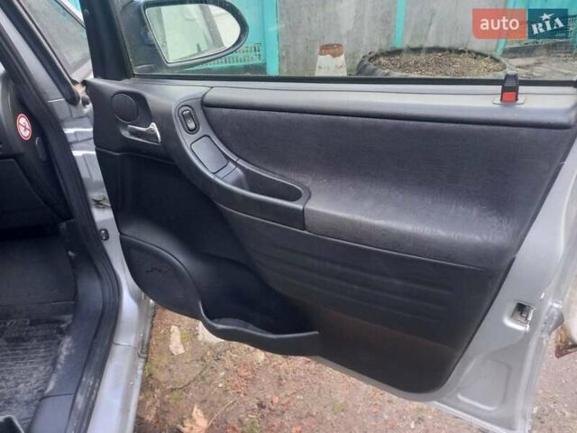 Серый Опель Зафира, объемом двигателя 2 л и пробегом 331 тыс. км за 2450 $, фото 6 на Automoto.ua