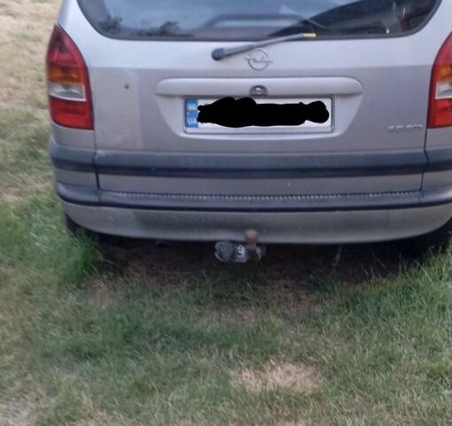 Серый Опель Зафира, объемом двигателя 2 л и пробегом 300 тыс. км за 1600 $, фото 1 на Automoto.ua