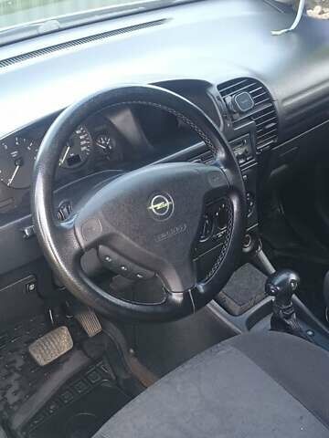 Серый Опель Зафира, объемом двигателя 1.8 л и пробегом 340 тыс. км за 3450 $, фото 10 на Automoto.ua