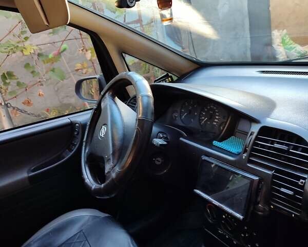 Сірий Опель Зафіра, об'ємом двигуна 2 л та пробігом 337 тис. км за 3800 $, фото 4 на Automoto.ua