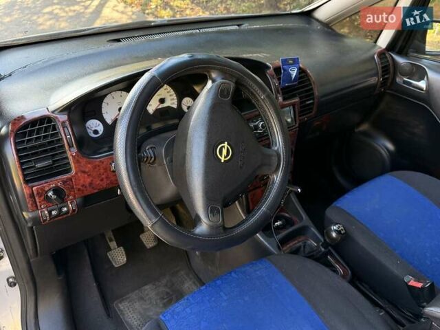 Серый Опель Зафира, объемом двигателя 1.8 л и пробегом 246 тыс. км за 5100 $, фото 10 на Automoto.ua