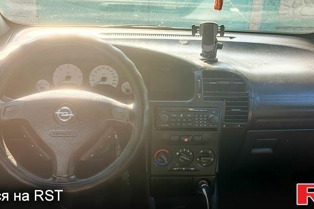 Серый Опель Зафира, объемом двигателя 2 л и пробегом 450 тыс. км за 4000 $, фото 5 на Automoto.ua