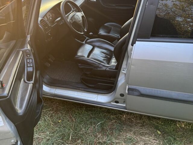 Серый Опель Зафира, объемом двигателя 2.2 л и пробегом 280 тыс. км за 2600 $, фото 7 на Automoto.ua