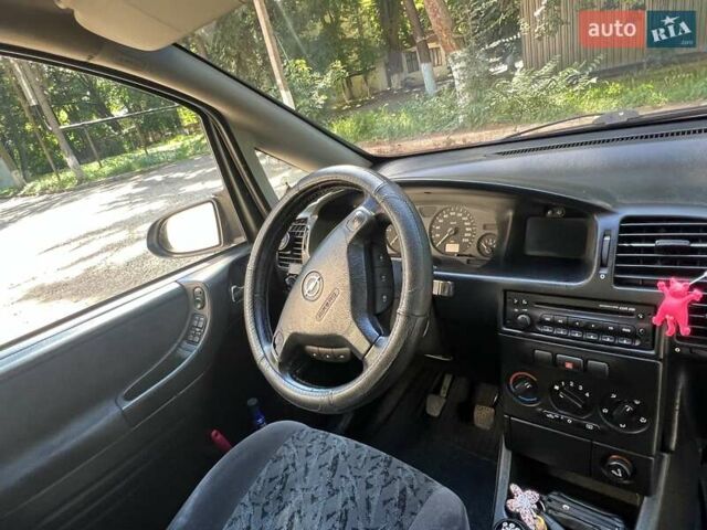Серый Опель Зафира, объемом двигателя 2.2 л и пробегом 338 тыс. км за 3200 $, фото 16 на Automoto.ua