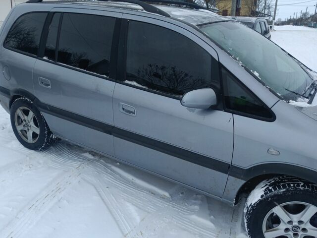 Серый Опель Зафира, объемом двигателя 2 л и пробегом 308 тыс. км за 3900 $, фото 3 на Automoto.ua