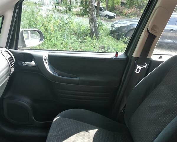 Серый Опель Зафира, объемом двигателя 1.8 л и пробегом 260 тыс. км за 5000 $, фото 1 на Automoto.ua