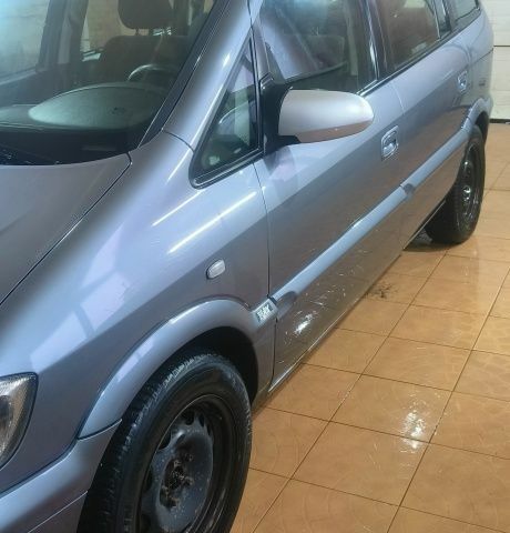 Серый Опель Зафира, объемом двигателя 1.6 л и пробегом 244 тыс. км за 2950 $, фото 1 на Automoto.ua