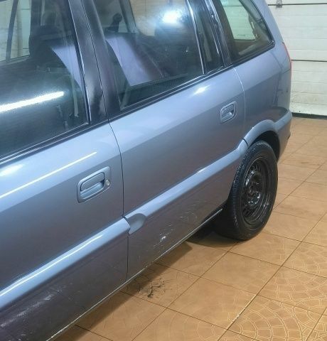 Серый Опель Зафира, объемом двигателя 1.6 л и пробегом 244 тыс. км за 2950 $, фото 4 на Automoto.ua