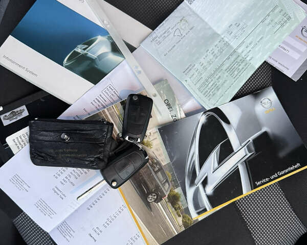 Серый Опель Зафира, объемом двигателя 1.8 л и пробегом 250 тыс. км за 6140 $, фото 49 на Automoto.ua