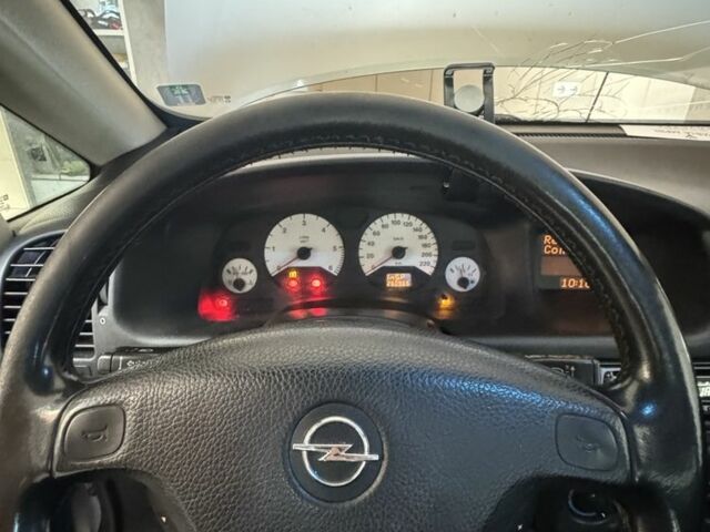 Серый Опель Зафира, объемом двигателя 2 л и пробегом 270 тыс. км за 2419 $, фото 2 на Automoto.ua