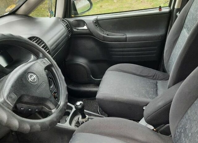 Серый Опель Зафира, объемом двигателя 2 л и пробегом 219 тыс. км за 1499 $, фото 4 на Automoto.ua