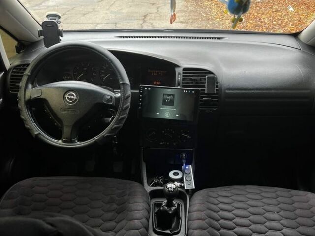 Синий Опель Зафира, объемом двигателя 1.8 л и пробегом 240 тыс. км за 3700 $, фото 11 на Automoto.ua