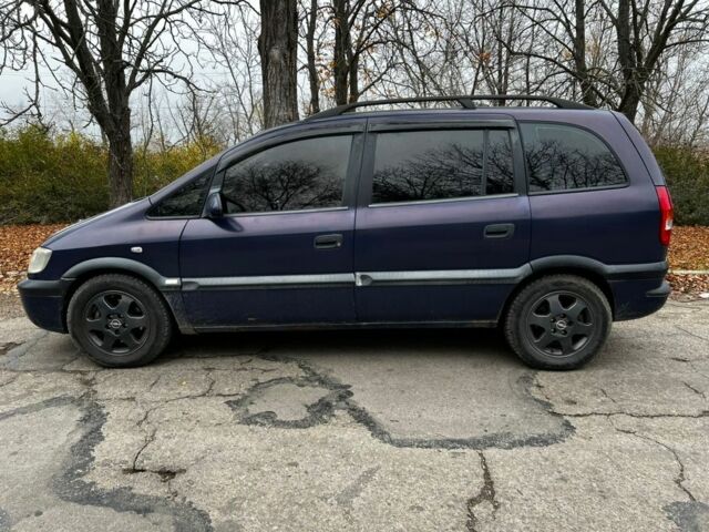 Синий Опель Зафира, объемом двигателя 1.8 л и пробегом 240 тыс. км за 3700 $, фото 2 на Automoto.ua